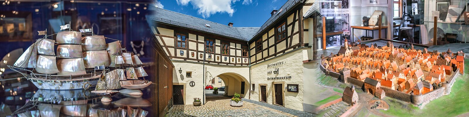 Das Freiberger Tor des Perlmutter- und Heimatmuseums Adorf (Foto: Lenk- Klingenthal) mit einem kleinen Einblick in die Austellung